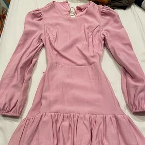 Pink ruffle dress with open back
